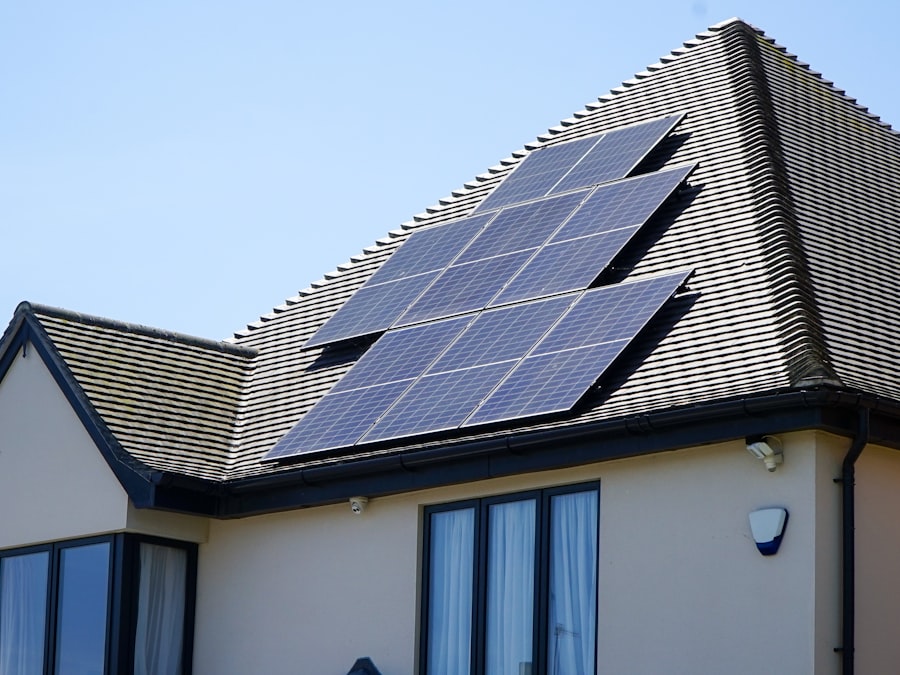 Completed residential solar array of twelve panels laid out flush across a tiled pitched roof
